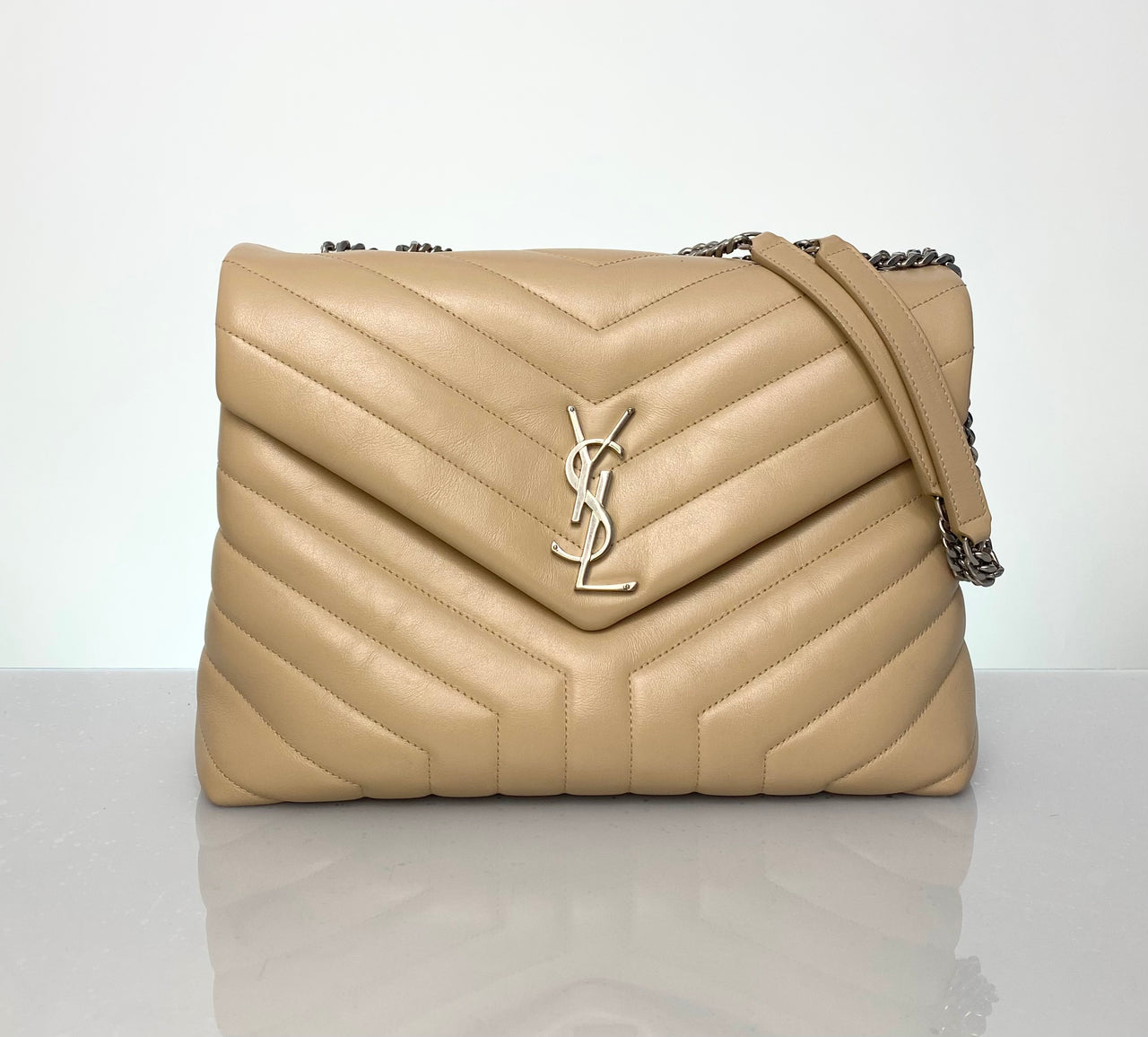 Saint Laurent LouLou Medium

YSL LouLou beige leather bag

Preloved YSL LouLou shoulder bag

YSL brushed silver hardware

Convertible chain strap YSL bag

Authentic Saint Laurent bag

Designer beige leather bag

YSL LouLou Medium preloved

Saint Laurent bag 9/10 condition

YSL shoulder bag with pockets